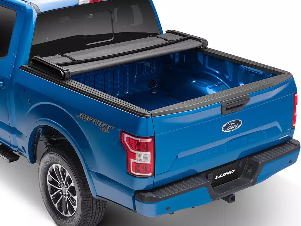 Lund Genesis Elite Hard Tri-Fold Tonneau Cover with Toolbox Mount | TruckBedShop